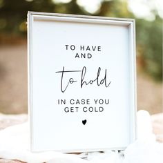 a white framed sign with the words to have and to hold in case you get cold