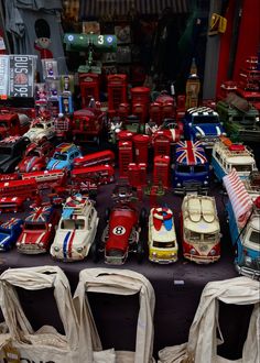 many toy cars are on display for sale