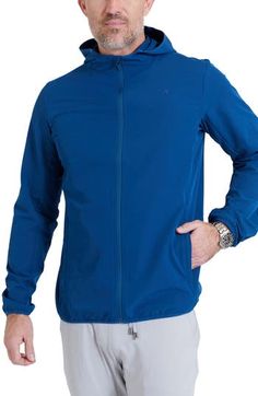 A relaxed fit allows for easy layering in this lightweight jacket complete with a fixed hood for additional cold-weather coverage. 28" length (size Medium) Front zip closure Fixed hood Front welt pockets 95% polyester, 5% spandex Machine wash, tumble dry Imported Hooded Athleisure Outerwear For Travel, Blue Windproof Hooded Outerwear, Functional Blue Windbreaker With Double-lined Hood, Gore-tex Windbreaker With Detachable Hood For Outdoor, Windproof Hooded Gore-tex Outerwear, Blue Nylon Outerwear With Double-lined Hood, Nordstrom Store, Mens Outerwear, Lightweight Jacket