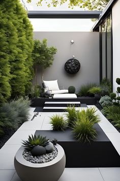 a modern garden with black and white accents