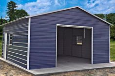 a blue garage with the door open and no windows on the side, in front of a grassy field