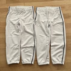 2 Pack New Kids Baseball T Ball Pants With Drawstring Brand: Teamwork Athletic Apparel Size: Medium Toddler (3-6 Years Old) Age May Vary Color: White W/Black Piping On Sides Quality: High Style: Elastic Bottom Condition: Brand New Never Worn. Tags Were Removed. Measurements Waist - 11 Inches Flat (22-24 Inches) Inseam: 17 Inches Length: 24 Inches Please See My Closet For Other Brand New Toddler, Youth, And Adult Baseball Pants. Listings Updated Regularly. White Cotton Bottoms With Contrast Trim, White Stretch Bottoms For Playwear, Boys Denim Jeans, Carhartt Overalls, Navy Blue Chinos, Camouflage Cargo Pants, T Ball, Classic Denim Shorts, Camouflage Shorts