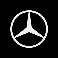 the mercedes logo is shown in white on a black background, it appears to be an emblem