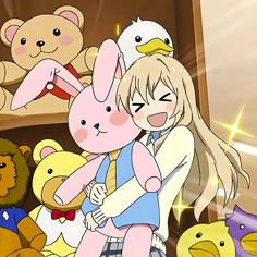 an anime character hugging another character with stuffed animals around her and teddy bears in the background