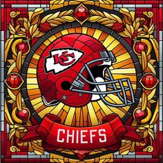 a stained glass window with a kansas chiefs football helmet on it and the words chiefs in red