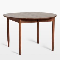 an oval wooden table with two legs