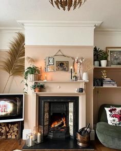 a living room filled with furniture and a fire place