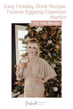 a woman holding a mug in front of a christmas tree with the words, easy holiday drink recipe festive eggnog espresso martini try this recipe