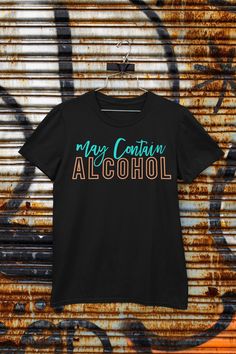 May Contain Alcohol Funny T-Shirt, Gift Idea, Funny Unisex Shirt, Slogan T- Shirt, Drinking Humor, Alcohol Humor, Weekend Apparel, Party Tee Quality is important to us. All t-shirts are custom made to order and are printed using the latest ink to garment technology. This is not a cheap heat transfer or screen print. This T-Shirt is everything you've dreamed of and more. It feels soft and lightweight, with the right amount of stretch. It's comfortable and flattering for the whole family. Sizing c Alcohol Shirts, Alcohol Funny, May Contain Alcohol, Alcohol Humor, Drinking Humor, Drinking Shirts, Adulting Shirts, Merchandise Design, Funny T Shirt