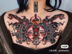 a woman with an elaborate tattoo on her chest