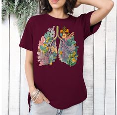 The heavy cotton material and double-needle stitching make the Gildan 5000 t-shirt very durable. A preshrunk jersey knit means you don't have to worry about shrinkage in the wash. Nursing Tshirts, Lungs, Womens Clothing Tops, Knit Jersey, Heavy Cotton, Cotton Material, Nursing, Anatomy, Stitching