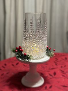 a white cake on top of a red table