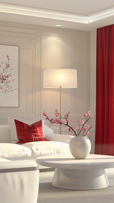 a living room with white furniture and red curtains