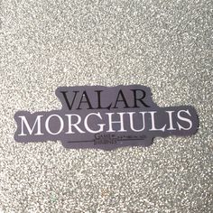 there is a sticker that says valar morghulis