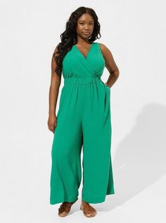 FIT Model is 5'10” wearing size 1. . 25” inseam. . Wide leg. . Jumpsuit silhouette. MATERIALS + CARE Silky woven fabric. 100% polyester. . Machine wash cold. Tumble dry. Imported. DETAILS Crew neckline. . Tie back detail. . Sleeveless. Front pockets. . . The best plus size women's vacation surplice wide leg jumpsuit jumpsuits in bosphorus made of polyester. Rock your look from Torrid to Festivals like Coachella and Lollapalooza, a concert, a show, or just for fun! Black Beachwear, Chubby Fashion, Heck Yeah, Sheer Shorts, Dress With Cardigan, Swim Dress, Wide Leg Jumpsuit, Dress Romper, Shop Blouses