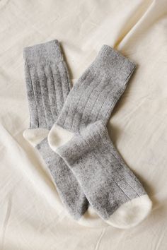 Le Bon Shoppe classic cashmere socks in grey melange. Vintage-esque Cashmere blended socks with a wide ribbing detail and tonal contrasting heel and toe. This elegant and classic sock will be your go to gal during the colder season. 24% cashmere, 27% superfine wool, 27% nylon, 20% polyester, 2% spandex. Made in South Korea. PIPE AND ROW Classic Gray Socks For Winter, Classic Gray Winter Socks, Soft Gray Winter Socks, Classic Cashmere Socks For Winter, Classic Fall Cashmere Socks, Casual Cashmere Socks For Winter, Casual Cashmere Winter Socks, Classic Solid Winter Socks, Classic Winter Socks