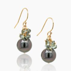 Gold, Pearl & Stone Earrings - Add a touch of sparkle and shine to your look with these stunning earrings featuring a cluster of gray sapphire briolletes and classic black Tahitian pearls. The petite faceted greenish-gray sapphires add a subtle sparkly element, making these earrings a perfect choice for any occasion. Gray Sapphire, Grey Sapphire, Tahitian Pearl Earrings, September Birthstone Jewelry, Tahitian Black Pearls, Forever Jewelry, Jewelry Ring Box, Pearl Jewellery Earrings, Pearl Gemstone