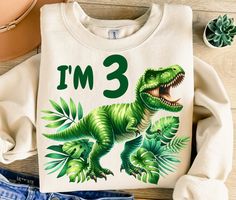 a t - shirt that says i'm 3 with a dinosaur on it