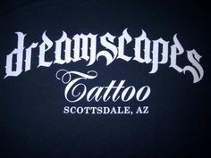 a black t - shirt with the words dropstops tattoo written in white on it