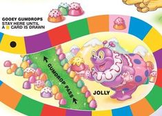 the game board has an image of a cartoon character on it, and is surrounded by candy