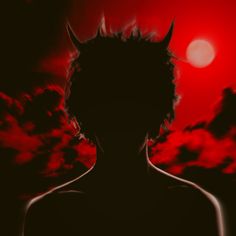 the silhouette of a man with horns on his head in front of a red sky