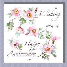 a card with pink flowers and the words wishing you a happy anniversary