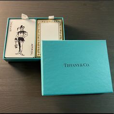 the tiffany & co jewelry box is open and has an image of a man on it