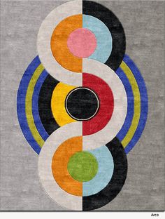 an abstract rug with multiple circles in different colors and sizes on grey background, including black, white, red, yellow, blue, green