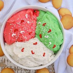 two ice creams in a bowl with sprinkles on the top and bottom