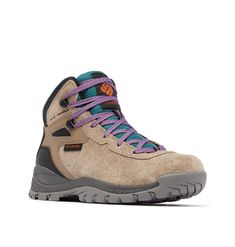 a women's hiking shoe with purple and blue laces on the outstep