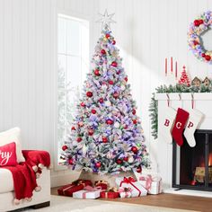 a decorated christmas tree in a living room