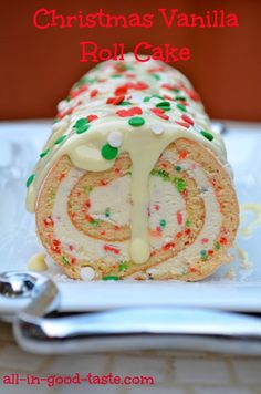 christmas vanilla roll cake on a white plate