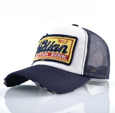 Men's vintage trucker cap: the iconic accessory for a casual and trendy look

 The vintage trucker cap for men is an iconic fashion accessory that is perfect for those looking for an authentic vintage look. With its unique design and distinctive shape, this cap offers protection from the sun, rain and wind during outdoor activities. It is characterized by its foam front crown, curved visor and mesh at the back that provides good ventilation for optimal comfort . The vintage trucker cap for men is decorated with classic logos and patterns for an authentic vintage look. It is perfect for casual outfits for an authentic and relaxed style. It is also ideal for festive events, such as music festivals or outdoor parties. Discover our collection of vintage trucker caps for men and find the one th Bone Bordado, Sweat Vintage, Trendy Caps, Mens 90s, Embroidery Baseball, Trendy Fashion Accessories, Green Cap, Stylish Caps, Mens Trendy Outfits