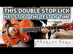 a man playing an electric guitar with the caption'this double stop lick has stood the test of time '