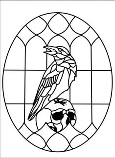 a stained glass window with a bird on it