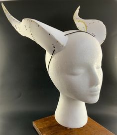 Cosplay horns pattern to make with EVA foam. Good for any fairy, elf, dragon, or magical creature costumes or cosplays. The painting and decorating is completely up to you to fit your character.  Important!: When printing out the pattern print it as "actual size" not "fit to page".  If you have any questions you can always go to my YouTube at Athena The Fairy for a tutorial.