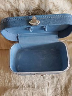 Rare Find, Rustic Powder Blue, Airplane No Name, Train Case or Makeup Suitcase, Mid Century Travel Box This is such a fun find. It is in good shape. It does have some wear and tear from age. (Please see pictures) Makes a great decoration, still very functional or would look good at a wedding reception. Perfect for a photo prop. This measures 7.40 inches tall, 7 inches deep and 12 inches long. Check out our shop for monthly specials. We have a variety of items for every taste. Combine several of Portable Blue Travel Cases, Blue Rectangular Travel Cases, Blue Rectangular School Case, Blue Rectangular Cases For School, Blue Portable Rectangular Case, Portable Blue Cases For Storage, Makeup Suitcase, Blue Airplane, Name Train