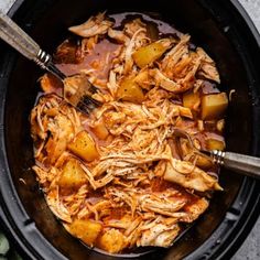 the food is being cooked in the slow cooker