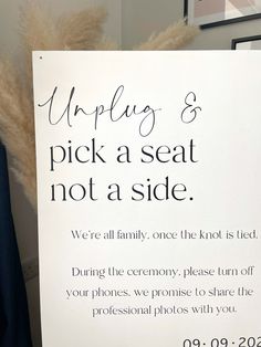 a sign that says pick a seat not a side