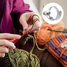 a woman is knitting yarn with her hands