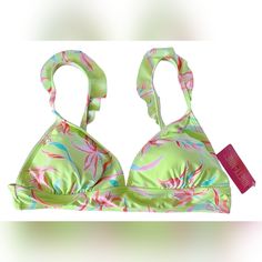 New With Tags. Introducing A Stunning Juniors Ninty-Nine Ruffle Midkini Bikini Swim Top In Xl Size. This Beautiful Top Comes In A Vibrant Pink Color With Accents Of Yellow, Blue, And Green. It Is Perfect For A Day At The Beach Or Any Pool Party With Its Classic And Colorful Design. Made With High-Quality Materials, This Bikini Top Is Comfortable To Wear And Will Last You For A Long Time. It Is Ideal For Teens Who Want To Make A Statement With Their Swimwear. Get Ready To Turn Heads With This Sty Green Ruffled Swimwear For The Pool, Green Tropical Swimwear For Holiday, Green Lined Swimwear For Vacation, Green Ruffles Swimwear For Poolside, Green Ruffled Swimwear For The Beach, Green Ruffled Swimwear For Sunbathing, Green Swimwear For Summer Holiday, Green Ruffled Swimwear For Beach, Green Summer Holiday Swimwear