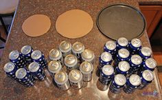 there are many cans of beer on the table