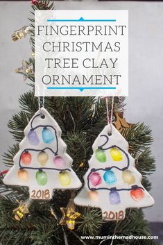 two christmas tree ornaments with the words fingerprint christmas tree clay ornament on them