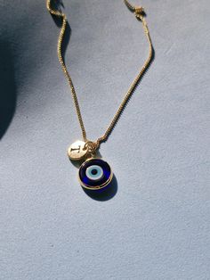 Evil eye   It is believed that evil eye beads draw in bad looks and thoughts,thereby protecting the owner of the bead from jealousy,negativity and harmful energies.  That's why gifting an evil eye bead to yourself or your loved ones is the most elegant and meaning way to say 'May everything be as you wish, may peace and safety be with you.' * If you need us to hand write a card for your loved ones, let us know and we are happy to help. Evil Eye Pendant Amulet Necklace, Evil Eye Amulet Jewelry, Evil Eye Amulet Pendant Necklace, Symbolic Evil Eye Round Pendant Necklace, Gold Evil Eye Jewelry For Blessing, Spiritual Evil Eye Pendant Necklace, Evil Eye Amulet Jewelry For Good Luck, Evil Eye Amulet Charm Necklace, Evil Eye Amulet Pendant Charm Necklace