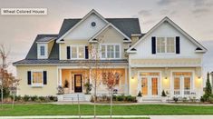 a large white house with lots of windows