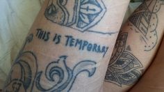 two people with tattoos on their legs that say, this is temporary