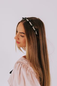 Take your headbands to the next level with the Glamorous Life Headband! This off white headband features chic black bow accents and elegant pearl details. Its coated tips keep it comfortably and securely in place, allowing you to rock any hairstyle with confidence. Upgrade your look and add some glam to your life! Details Off white head band Black bow accents Pearl details Coated tips Polyester Approximately 14.2" circumference White Head Band, White Head, Pearl Details, Upgrade Your Look, White Headband, Head Band, Black Bow, Next Level, The Next