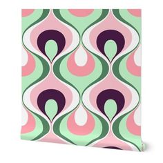 a pink, green and purple wallpaper with an abstract design on the back side