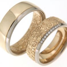 two gold wedding rings with diamond accents on each one, set against a white background