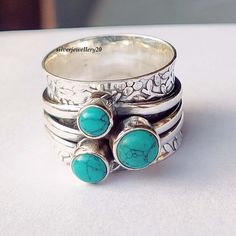 Turquoise Ring, Spinner Ring, Gemstone Ring, Brass Ring, Sterling Silver Ring, Copper Ring, Turquoise Jewelry, Natural Turquoise, Gift Her All my Designs are original. Stone - Turquoise Stone Shape - Pear Setting - Bezel This is a classy fine hand-crafted sturdy Turquoise Ring This Turquoise Ring is great for casual or dressy wear This Ring is for women You will receive a Ring like the one in the pictures This Ring have 925 Stamp Suitable for use in everyday situations, or can also be used as a Blue Bohemian Stackable Rings, Bohemian Blue Handmade Stackable Rings, Unique Turquoise Sterling Silver Stackable Rings, Handmade Turquoise Toe Ring As Gift, Handmade Turquoise Stackable Rings In Sterling Silver, Adjustable Silver Turquoise Ring With Birthstone, Handmade Turquoise Toe Ring For Gift, Handmade Turquoise Stackable Rings, Turquoise Birthstone Ring In Sterling Silver